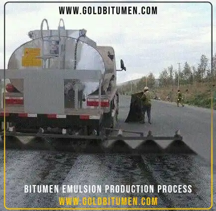 Heavy machinery spraying liquid bitumen emulsion as a tack coat on road surface illustrating the practical output of the production process