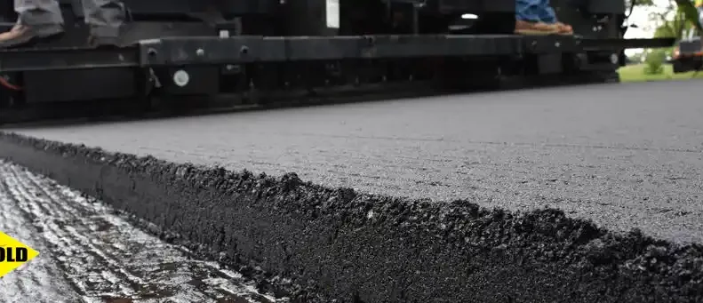 Asphalt paver machine laying the next generation of smart asphalt for highly durable and intelligent road technology