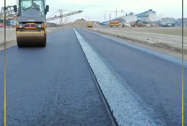 Visual comparison of eco-friendly bio-bitumen versus traditional petroleum bitumen applied in real road construction projects